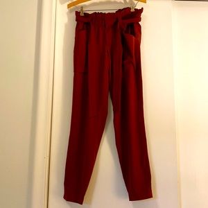 Athleta rust elastic waist trouser with belt.